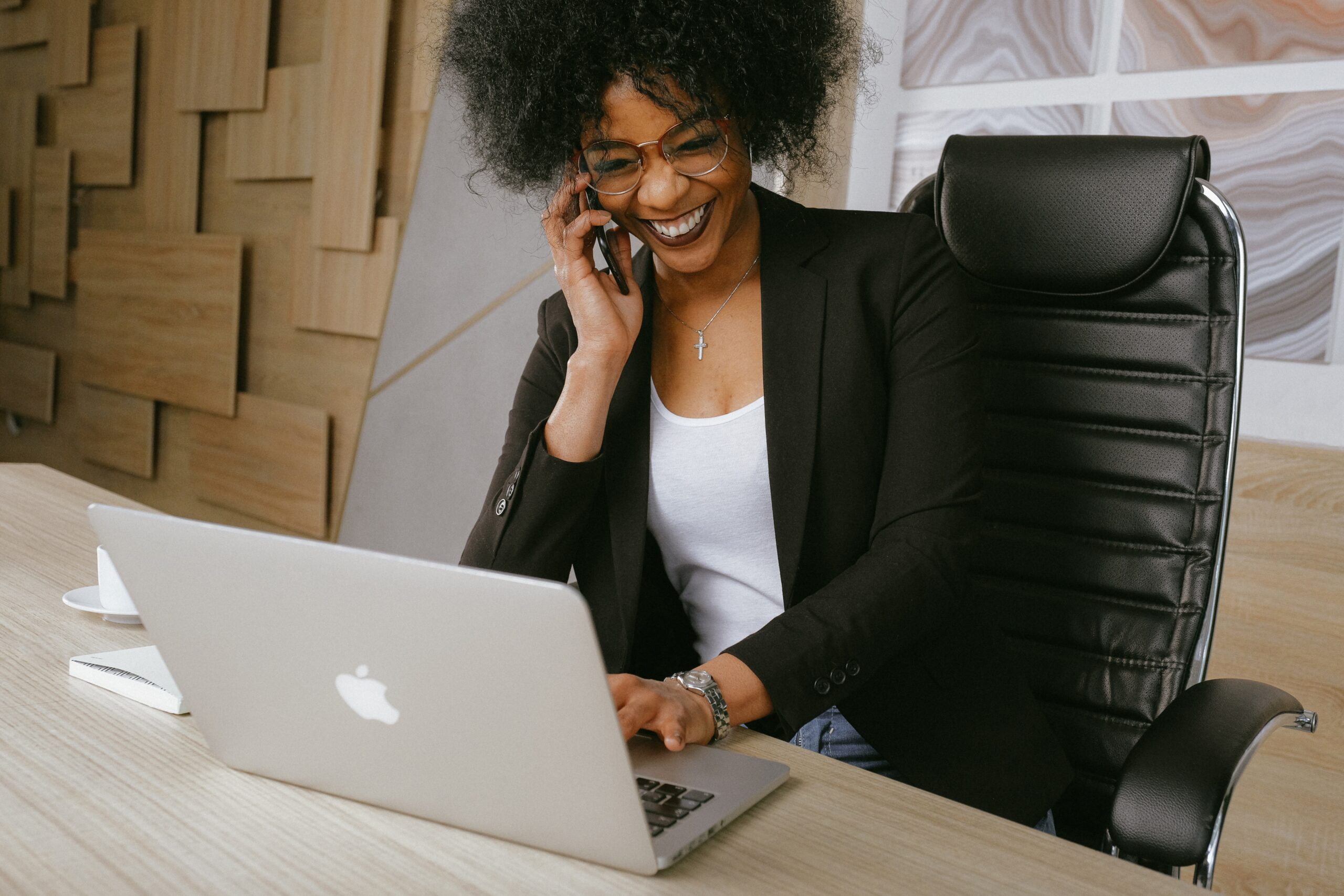 lady smiling on the phone at work