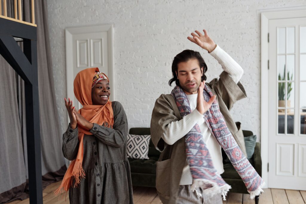 Two people dancing, looking after their mental health 